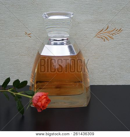 Fragrance For Ladies, Large Perfume Bottle In Front Of The Satin Wallcovering Elysee Decorated With 