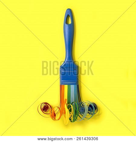 Brush With Swirling Rainbow Strips For Quilling. Artificial Object That Mimics Natural Shapes. Yello