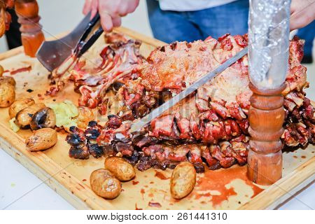 Roasted Meat Over An Open Fire, Cooked In A Special Way.barbecue Is Prepared Of Lamb Or Sheep Meat A