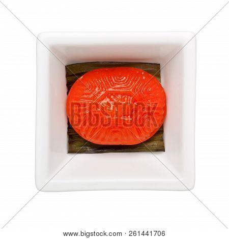 Traditional Chinese Pastry - Red Tortoise Cake In A Square Bowl Isolated On White Background