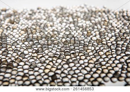 Macro Of Silica Gel Balls Laying On White Background
