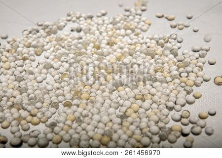 Macro Of Silica Gel Balls Laying On White Background