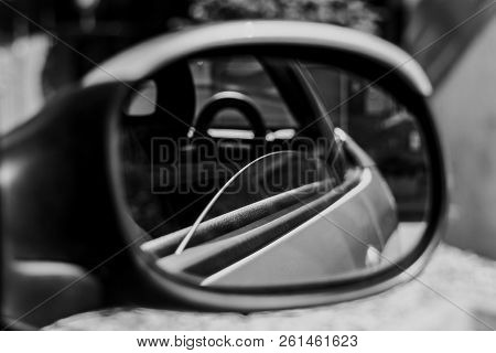 View From A Car In The Mirror