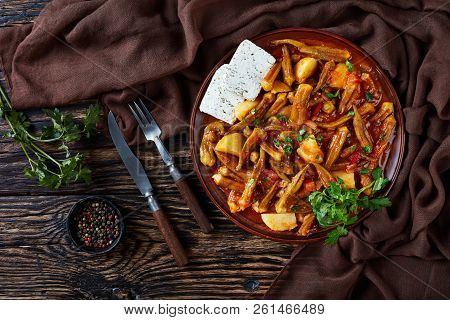 Tasty Greek Okra Stew With Potato Served With Feta Cheese Slices On A Earthenware Plate On A Rustic 