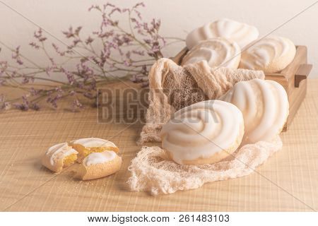 Coockies With Egg White Cover. Portuguese Sweets Known As Cavacas On Napkin In A Table.