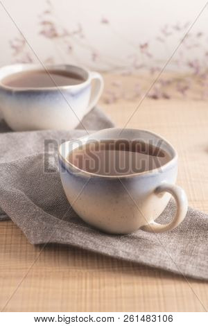 Coockies With Egg White Cover. Portuguese Sweets Known As Cavacas Served With Tea On Ceramic Cups.