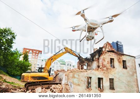 Drone operated by construction worker on building site