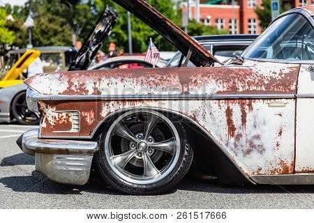 Matthews, North Carolina - September 3, 2018: Close Up Detail Of A Rusted Cadillac Parked On Display