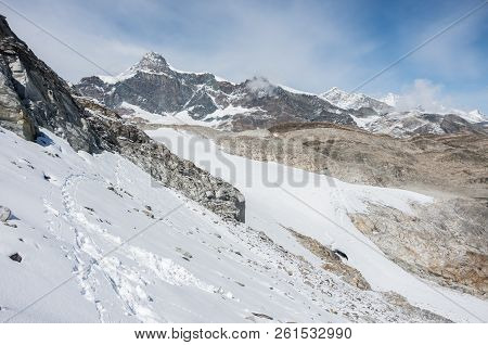 View Of Seewjinengletscher Glacier In Monte Rosa Massif. Schwarzberghorn Mount At Background. Switze