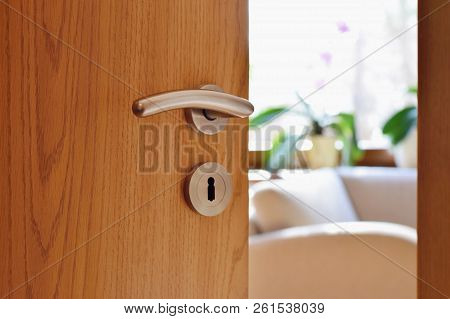 Half Opened Door Into The Cozy Home Interior