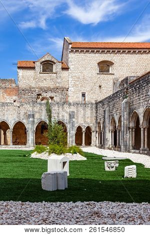 Santarem, Portugal - September 11, 2017: Cloister of Convento de Sao Francisco Convent. 13th century Mendicant Gothic Architecture. Franciscan Religious Order.