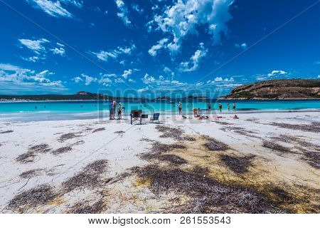 Hellfire Beah, Australia--february 9, 2018. Wide Angle Shot Of Tourists On The Beach And In The Wate