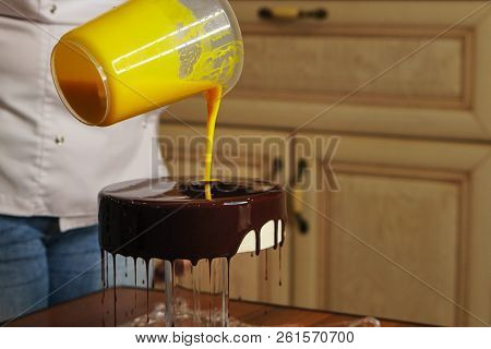 Cook Is Preparing A Mousse Cake Of Esterhazy. The Girl Pours Hazelnut Dacquoise Almondno Hazelnut Mo