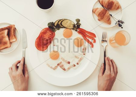 Hands With Knife And Fork. Breakfast Concept. Morning Nutricion. Kitchenware On Table. Knife And For