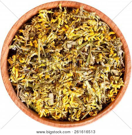 Dried Melilotus Officinalis Yellow Sweet Clower In A Small Wooden Bow.