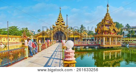 Yangon, Myanmar - February 27, 2018:  Outstanding Kyay Thone Pagoda (bronze Buddha Image) With Tradi