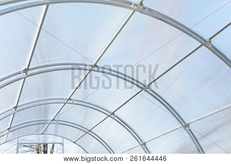 Greenhouse Made Of Polycarbonate And Metal Carcass. Small Hothouse For Private Use. Metal Constructi