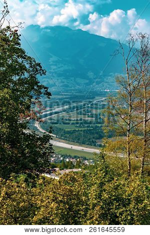 The Border Between Liechtenstein And Switzerland Seen From Triesenberg. The River Rhine Forms The Bo