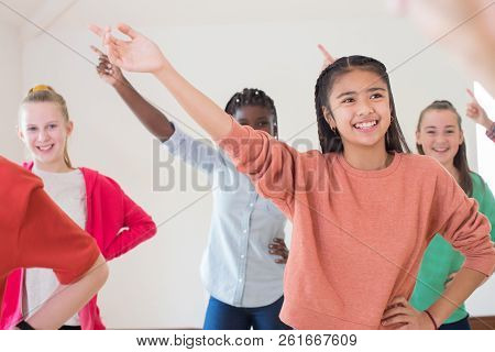 Group Of Children Enjoying Drama Class Together