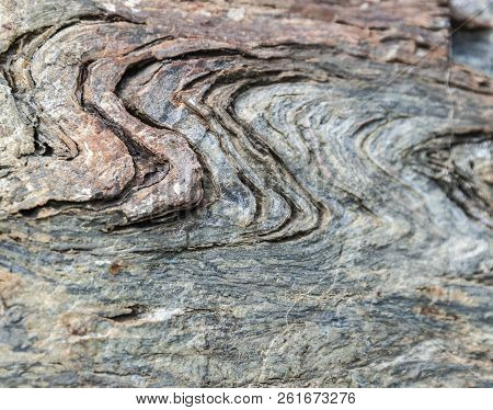 Repeating S Pattern In Rough Fieldstone In Outer Wall Of A Rockport, Maine Lime Kiln