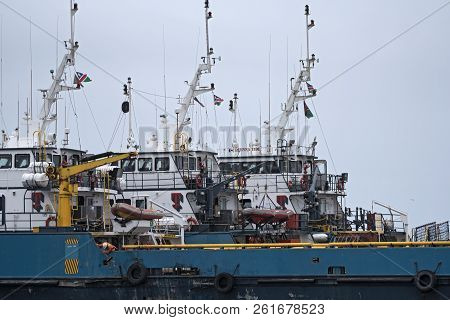 Walvis Bay, Namibia-november 10, 2017: Vessels In The Atlantic Harbor Of Walvis Bay, Namibia.