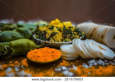 Close Up Of Popular Indian & Asian White Radish Salad Or Muli Ka Smabara On Wooden Surface With Whit