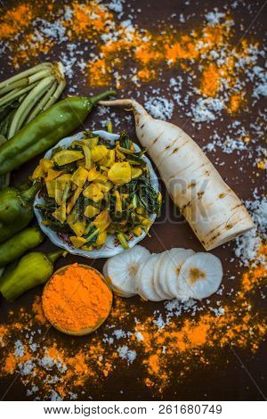 Close Up Of Popular Indian & Asian White Radish Salad Or Muli Ka Smabara On Wooden Surface With Whit