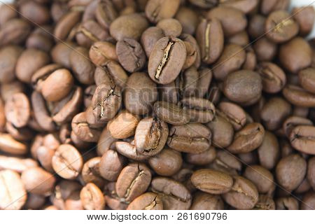 Top View Pattern With Brown Aroma Coffee Seeds Background