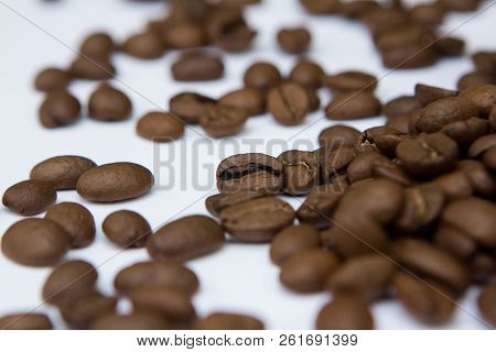 Brown Aroma Coffee Seeds Isolated On White Background
