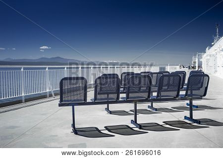 Nanaimo, Bc, Canada - May 27, 2017: Outdoor Seats And Western View Of Clear Blue Sky And Strait Of G