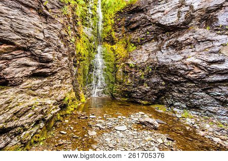 Little Waterfall In Green Summer Mountains, Norway.