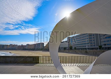 LA CORUNA, GALICIA, SPAIN - JUNE 5: Riazor beach white scuplture memorial to the Orzan Heroes at breakwater on June 5, 2017 in La Coruna, Galicia, Spain