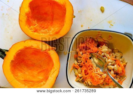 Pumpkin Innards Closeup Showing The Empty Pumpkin Next To It