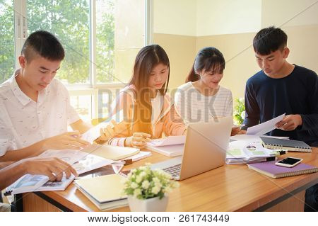 Co Working Team Meeting Concept: New Asian Genaration Business People Working And Studying Together 