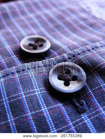 Macro Closeup Of Cuff Of A Vibrant Navy Blue Checked Formal Shirt Under Sunlight With Light Blue & R