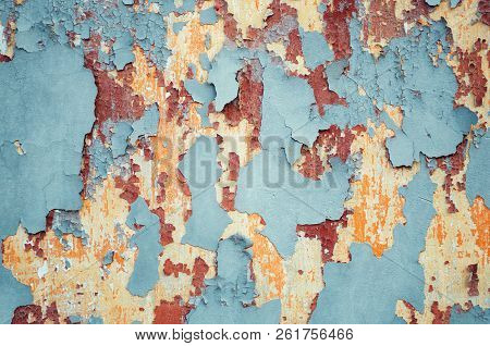 Wall Texture With Peeling Paint Of Several Colors