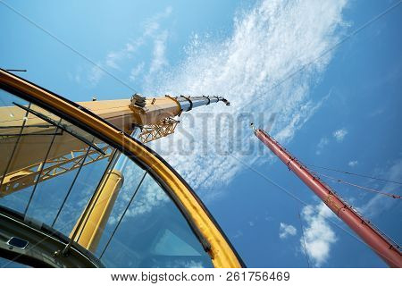 Crane Truck With Cargo In The Sky
