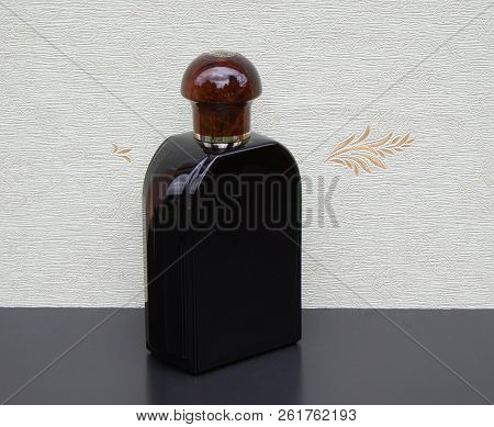 Eau De Toilette, Large Perfume Bottle In Front Of The Satin Wallcovering Elysee