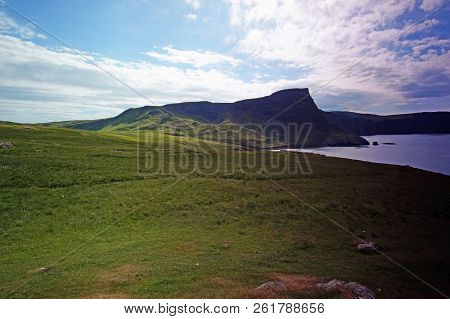 Neist Point Is A Small Peninsula On The Scottish Island Of Skye And Its Lighthouse Marks The Western
