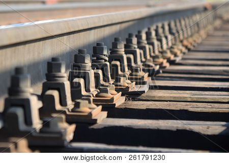 Railway Coupling Bolts Leaving Into The Distance. Perspective.
