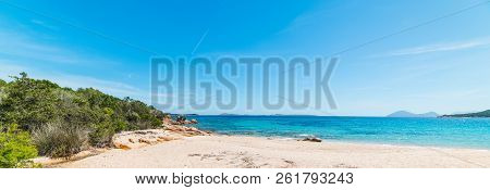 Liscia Ruja Beach In Costa Smeralda On A Sunny Day. Sardinia, Italy