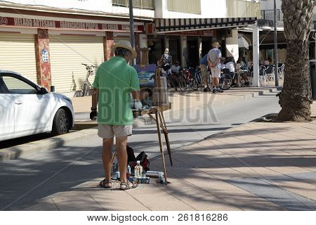 Pila De La Horadada Spain - 05 Oct 2018 : Painter At Work In Street