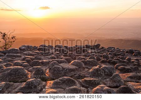 Silhouette Of Sunset And Light Flare At The Mountain Named Lan Hin Poom At Phu Hin Rong Kla National