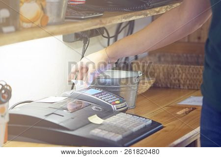 A Barmaid Registrating New Order By Cash-register. A Waiterss Restaurant Worker Registrating New Ord