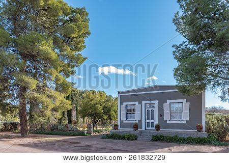 Loxton, South Africa, August 7, 2018: A Street Scene, With An Historic House, In Loxton In The North