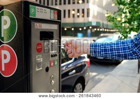 Man Is Paying His Parking Using Credit Card At  Parking Pay Station Terminal