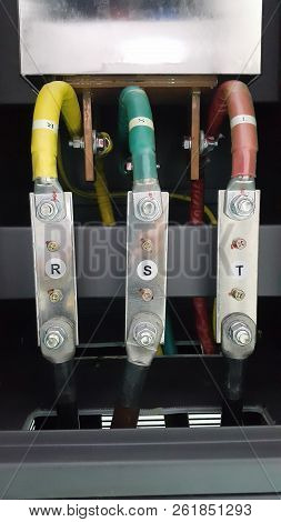 Electrical Parts And Mechanical Parts On Big Gear And Drum Rolls On White Floor