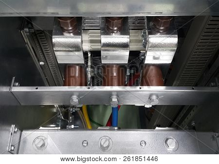 Electrical Parts And Mechanical Parts On Big Gear And Drum Rolls On White Floor