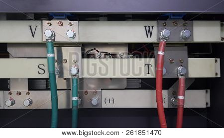 Electrical Parts And Mechanical Parts On Big Gear And Drum Rolls On White Floor