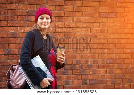 Portrait Female Student On Bright Brick Background. Beautiful Modern Urban Young Woman Wearing Red K